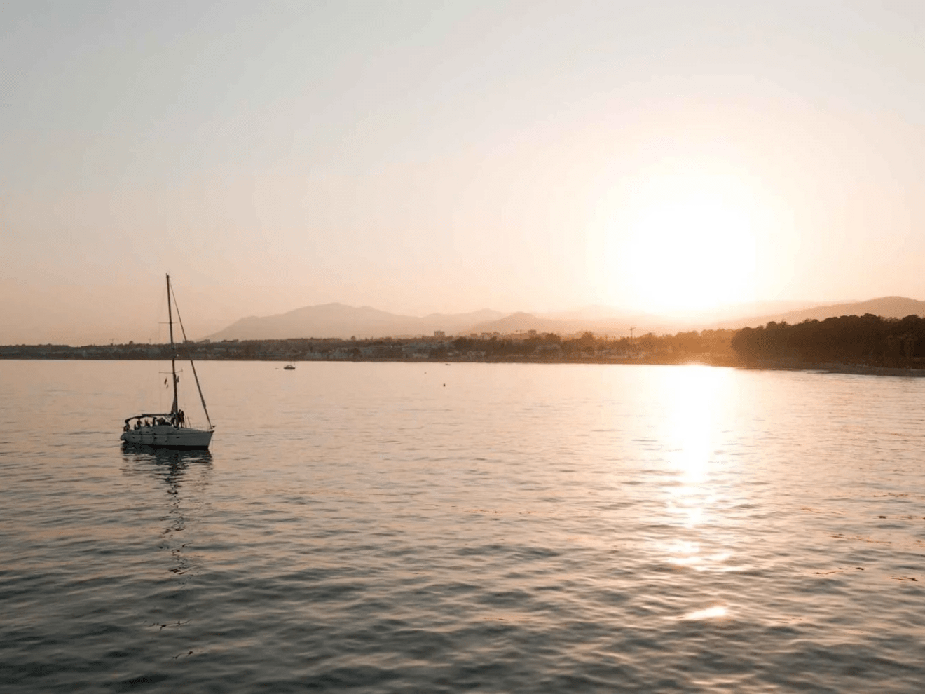 a small boat in a large body of water