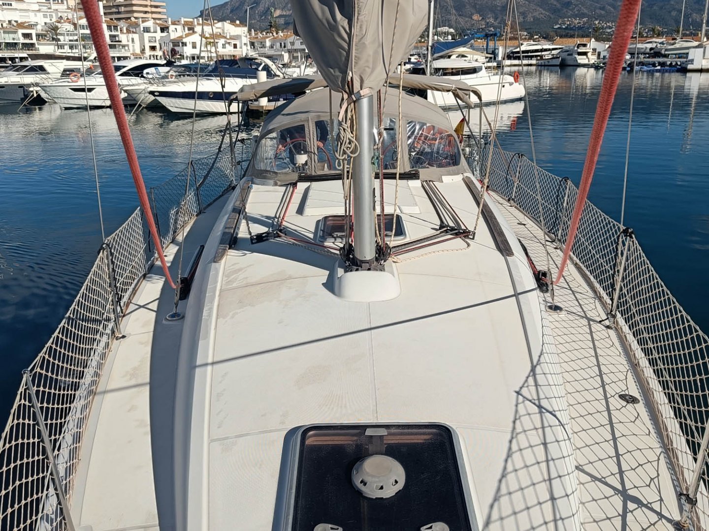 a boat is docked next to a body of water