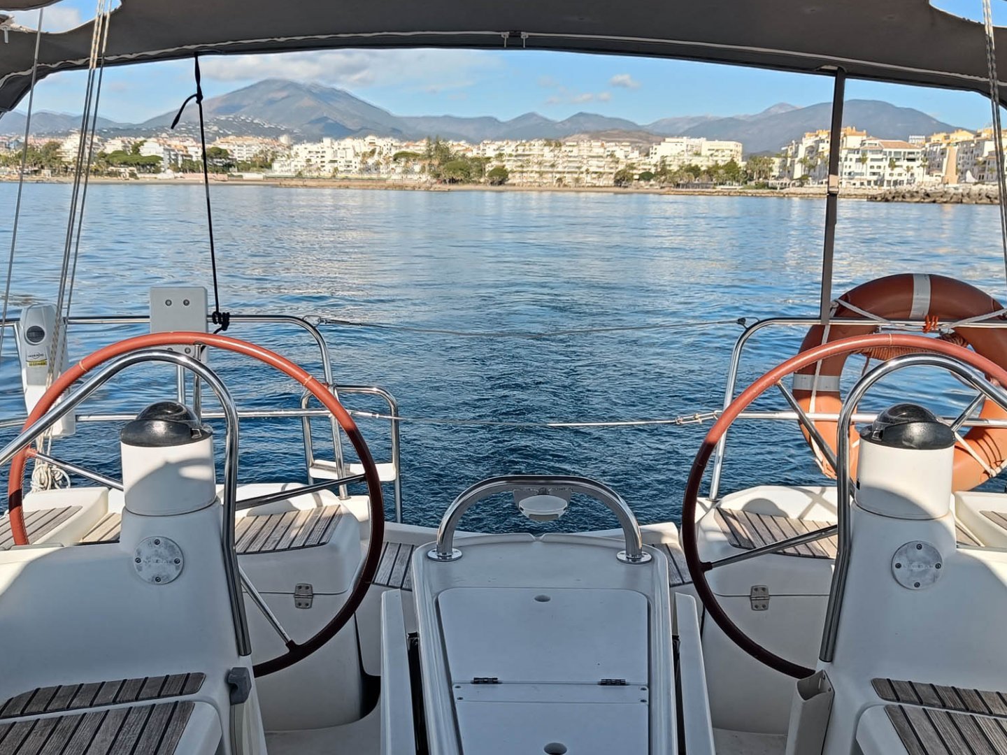 a boat is docked next to a body of water