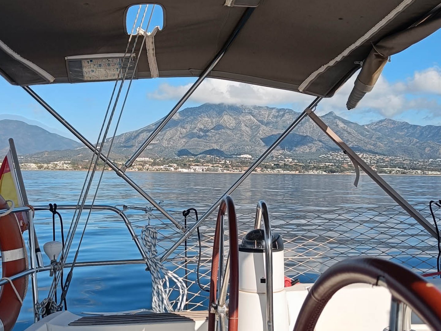 a boat is docked next to a body of water