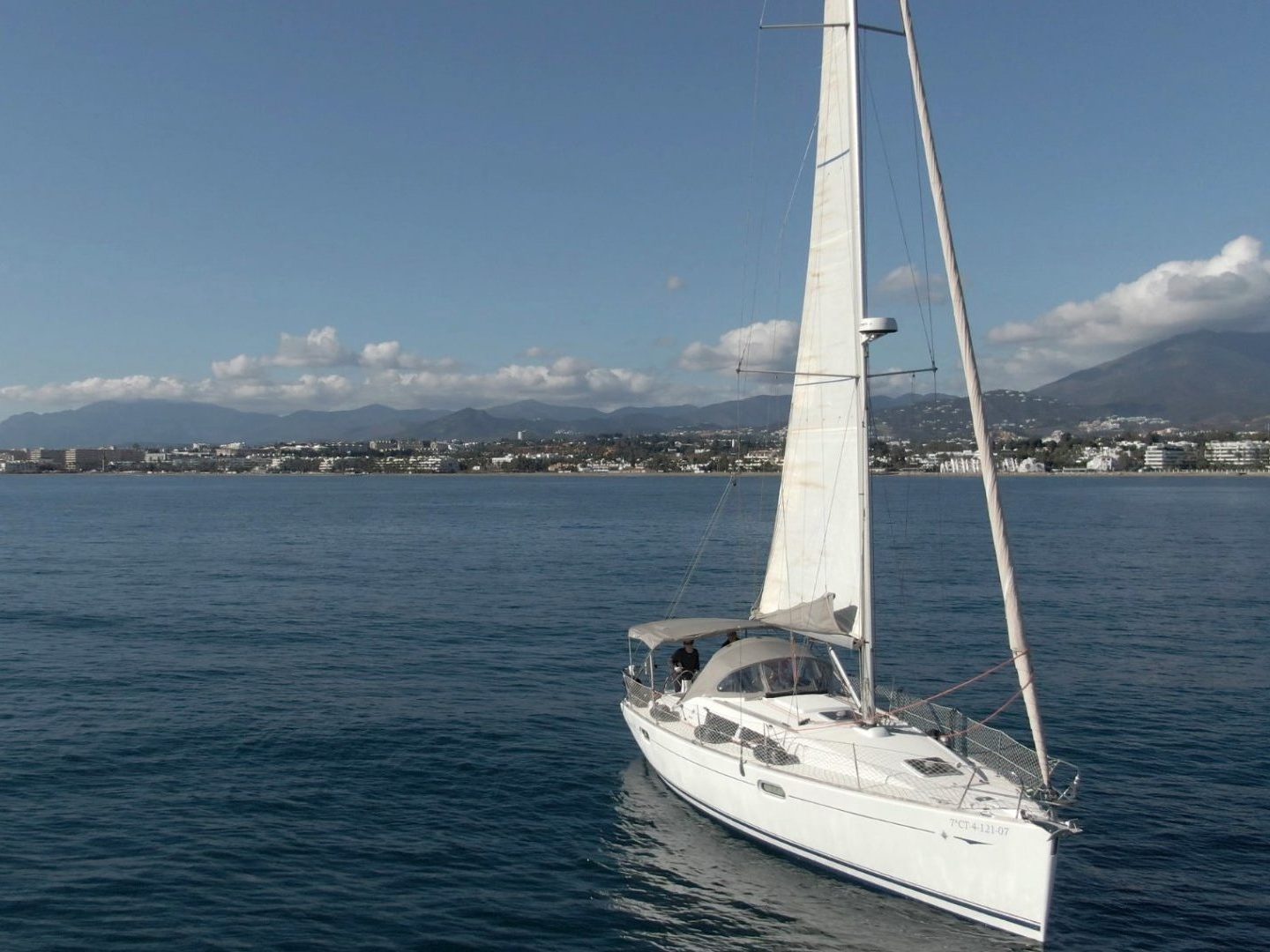 a small boat in a large body of water