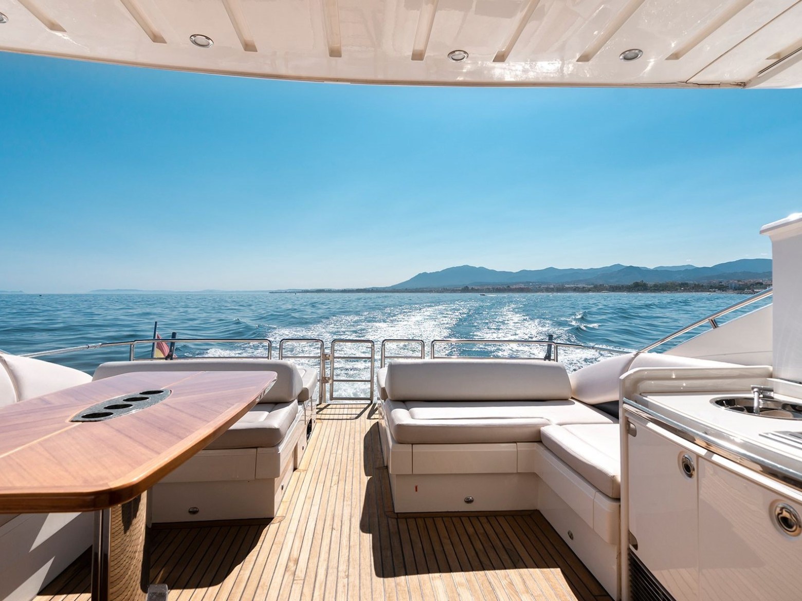 a boat sitting on top of a beach