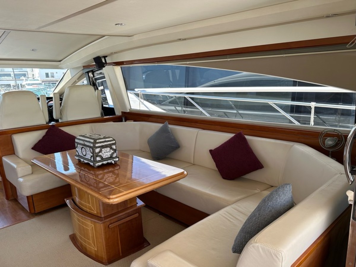 a bedroom with a bed and desk in a room