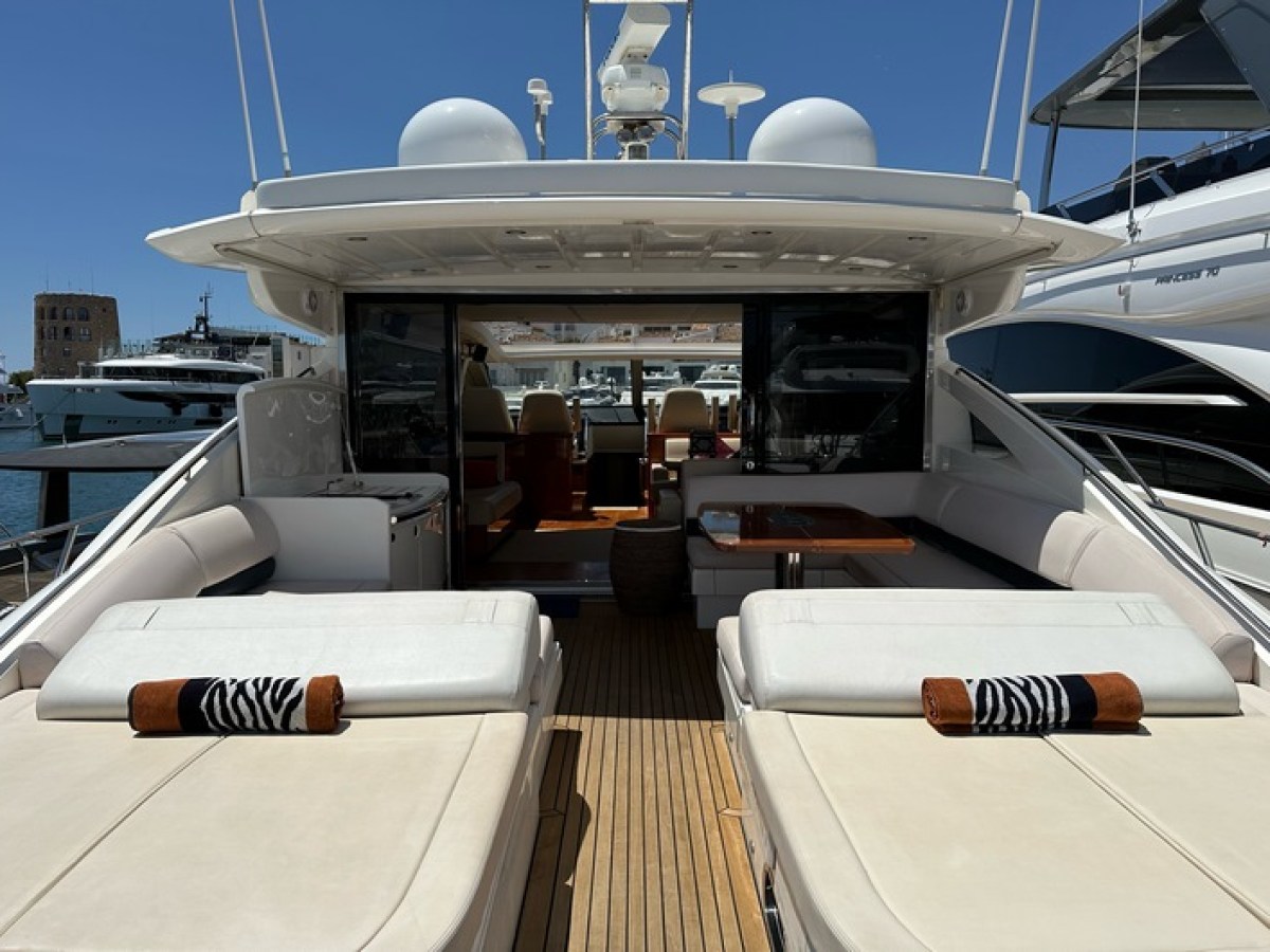 a boat sitting on top of a car