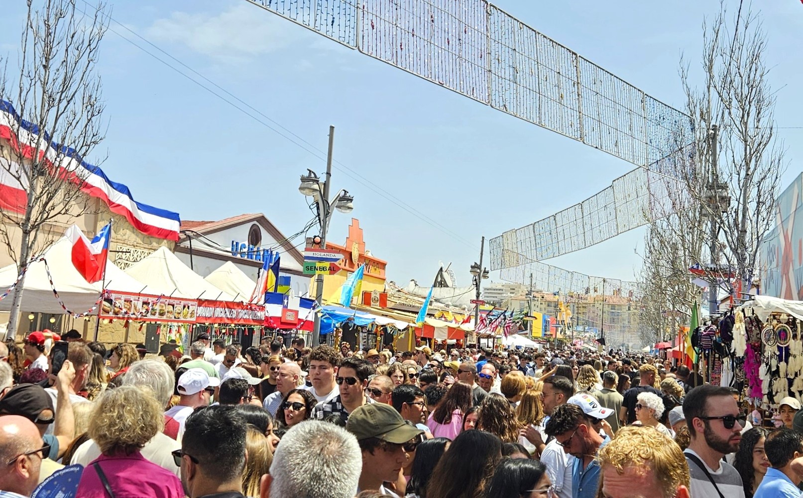 a group of people standing in front of a crowd