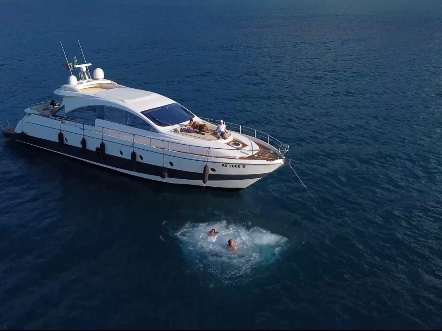 a small boat in a large body of water