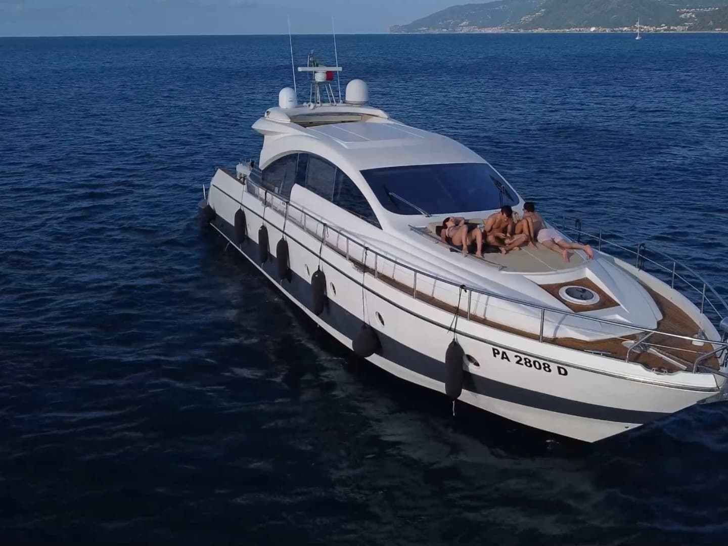 a small boat in a large body of water