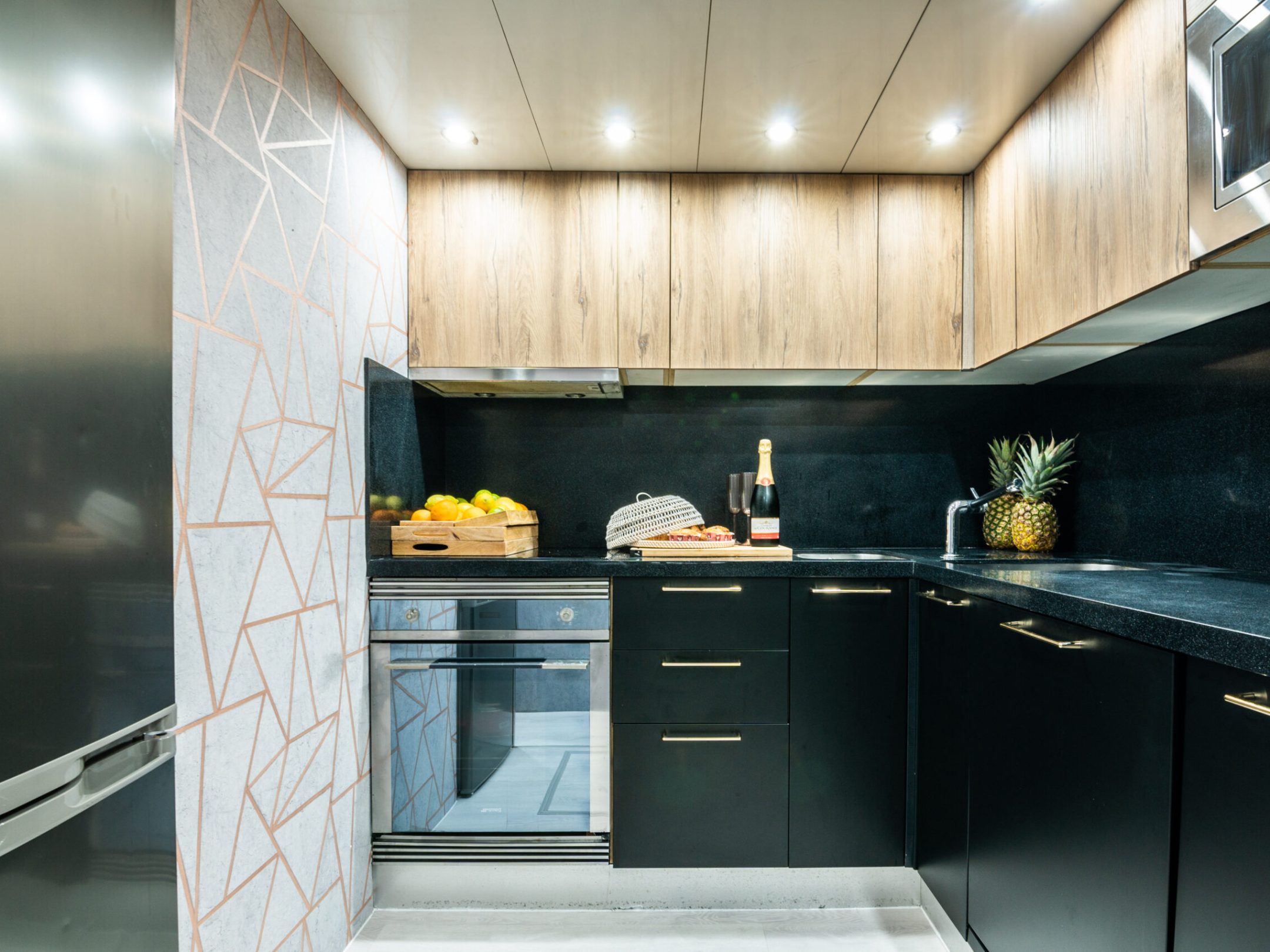 a kitchen with a stove top oven