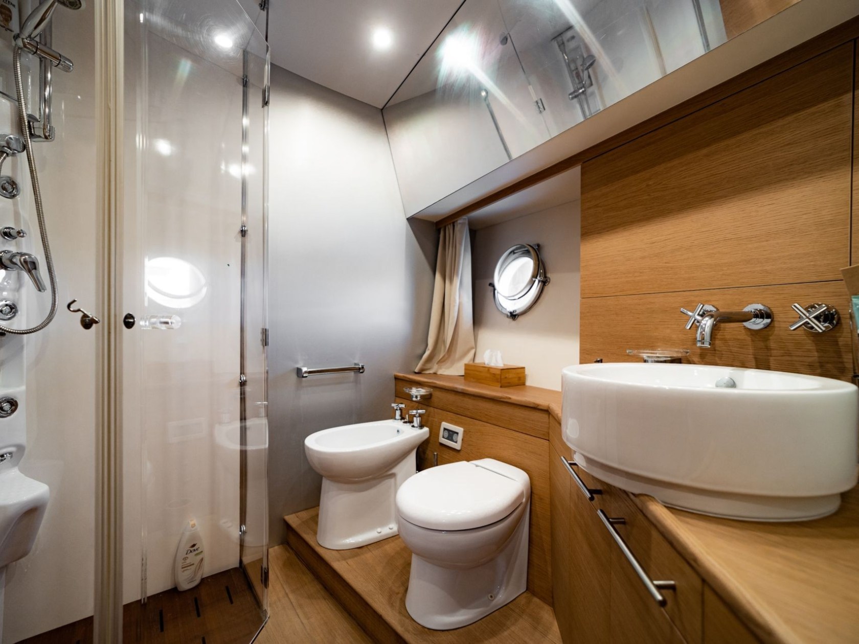 a restroom with a sink and a mirror