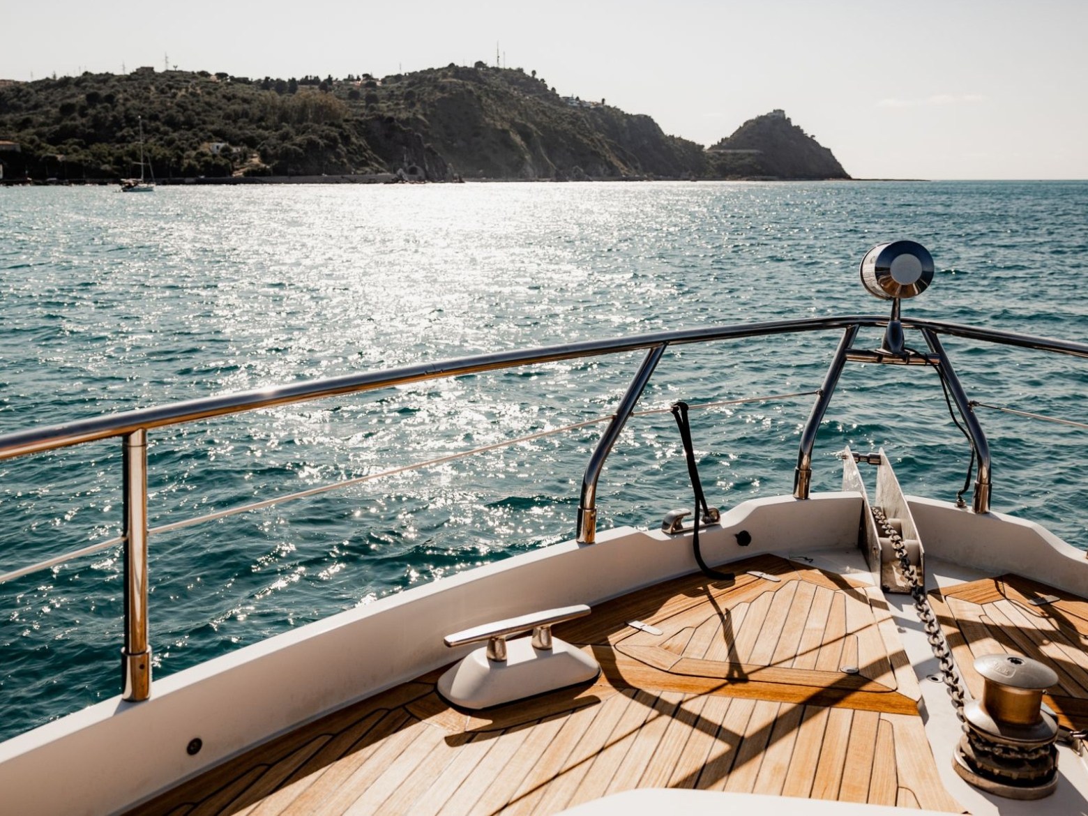 a boat sitting on top of a body of water