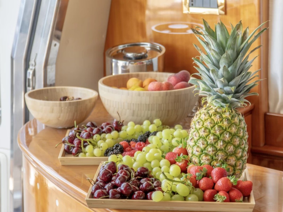 a bunch of fruit sitting on a counter