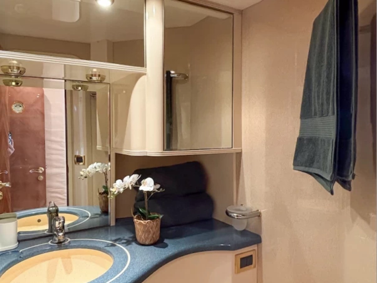 a restroom with a sink and a mirror
