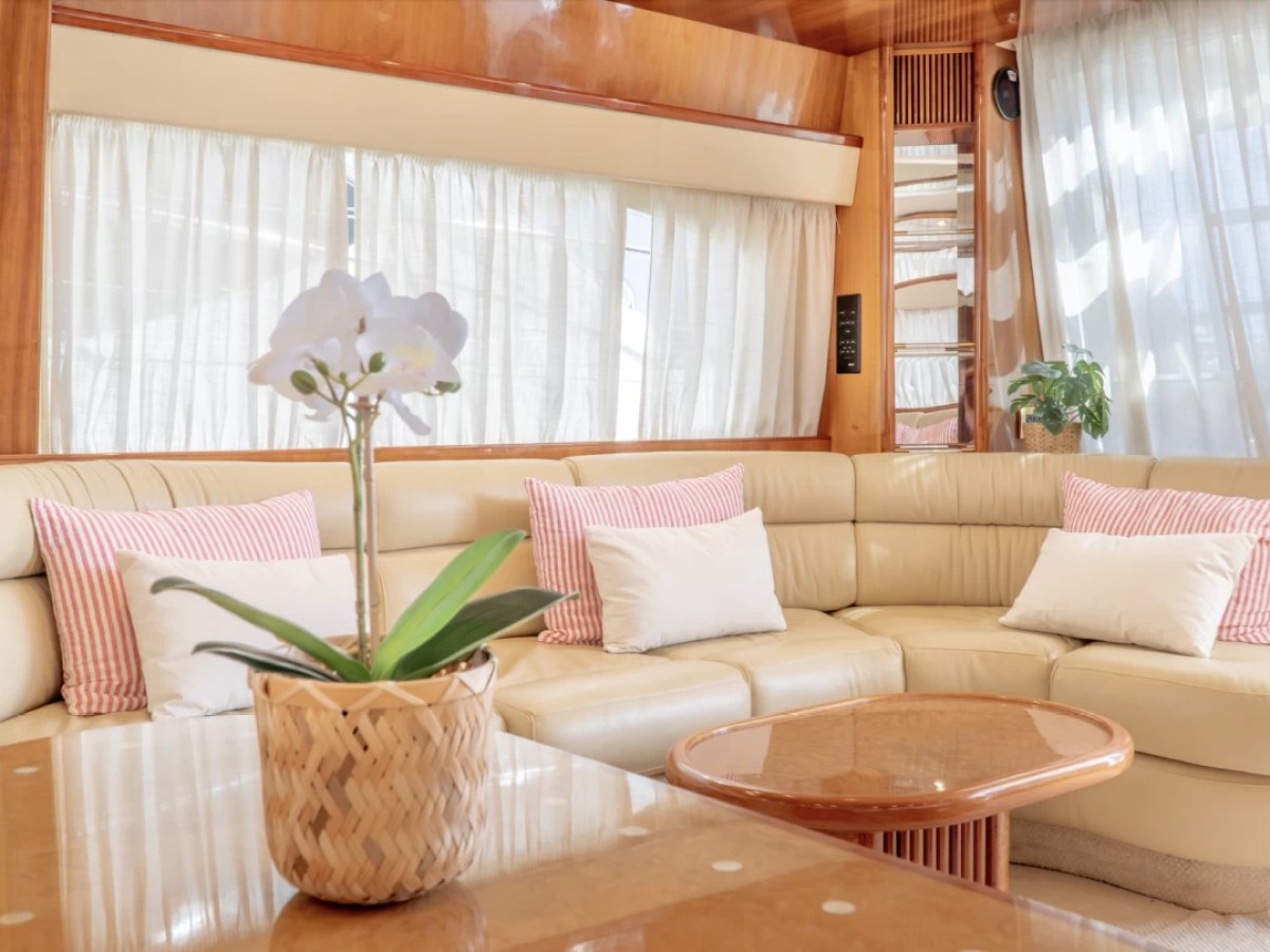 a living room filled with furniture and a window
