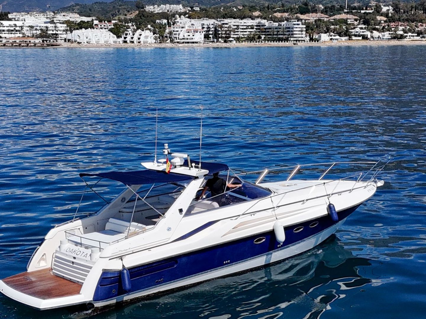 a small boat in a large body of water