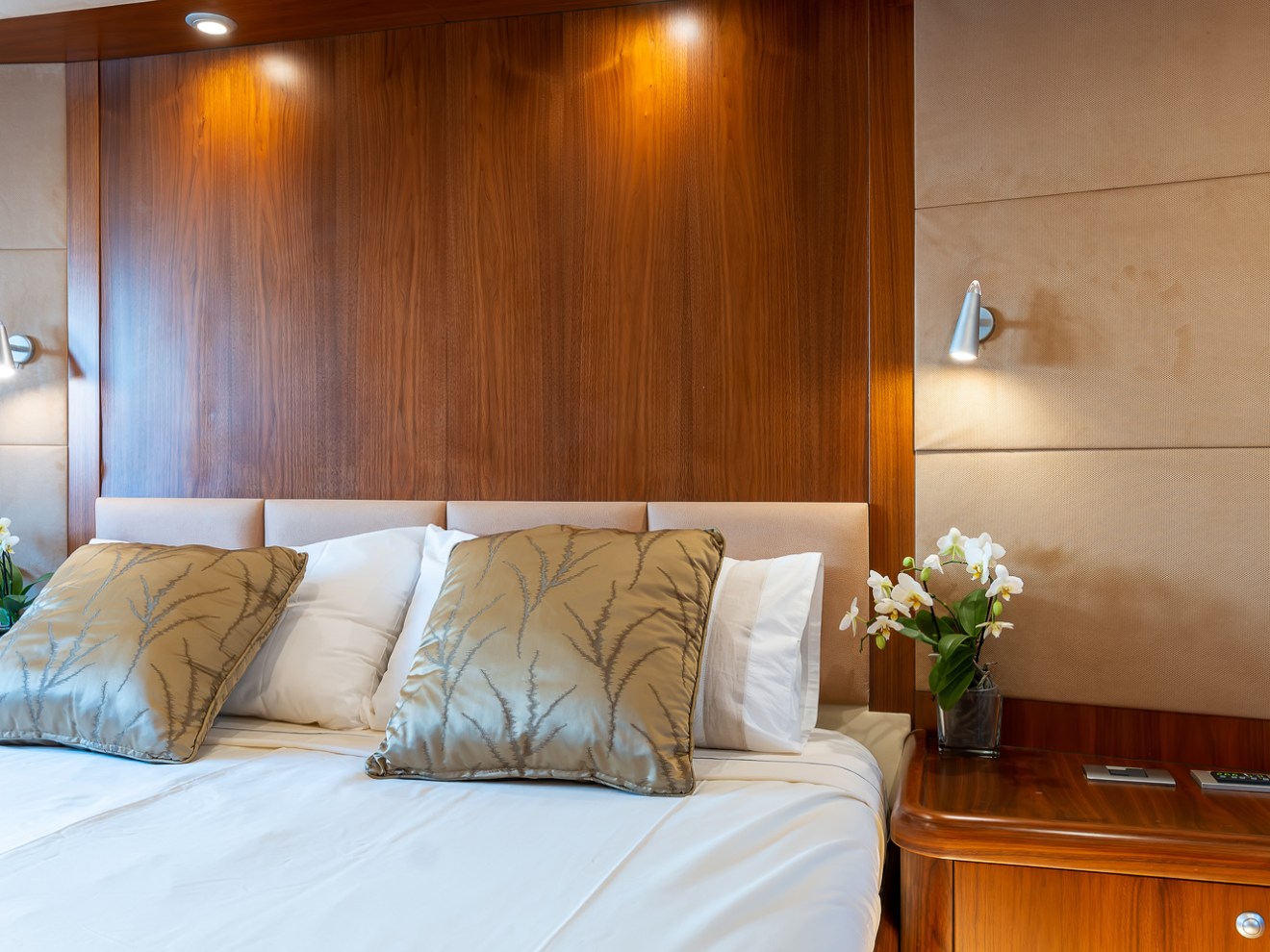 a bedroom with a large bed sitting in a room