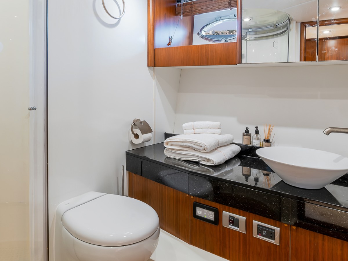 a room with a sink and a mirror