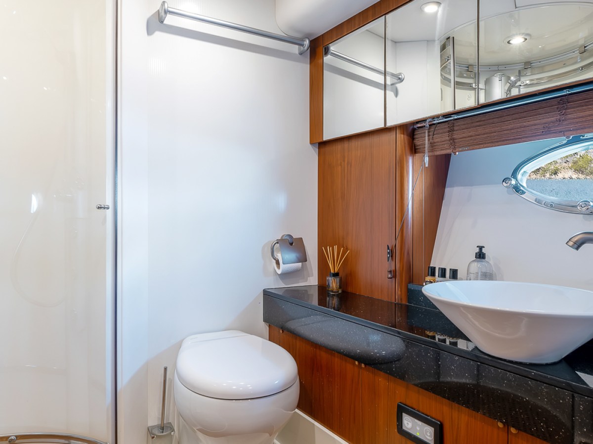 a room with a sink and a mirror