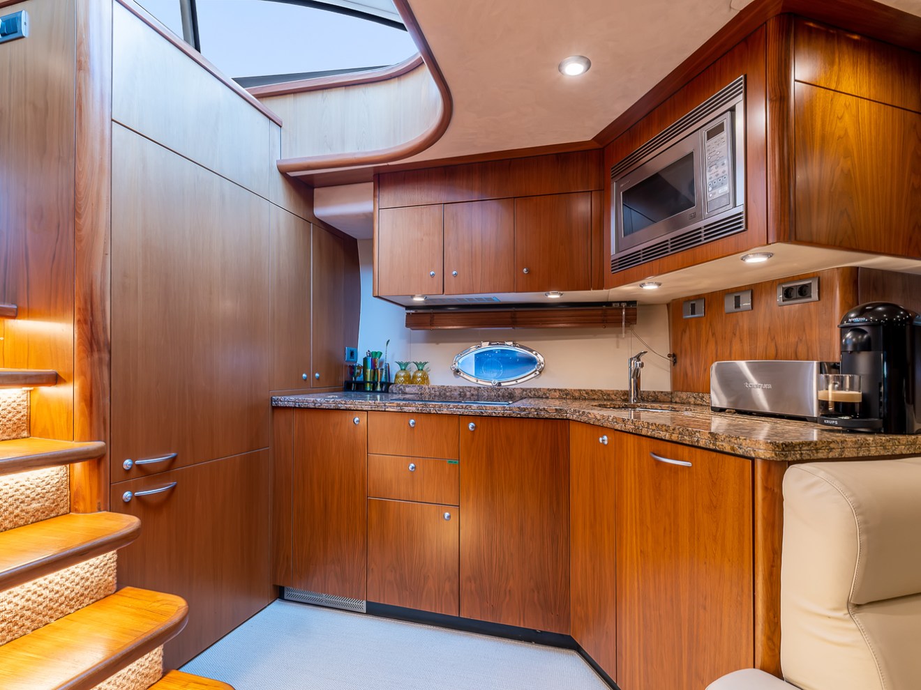 a kitchen with wooden cabinets