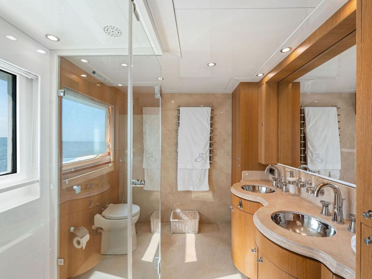 a room with a sink and a mirror