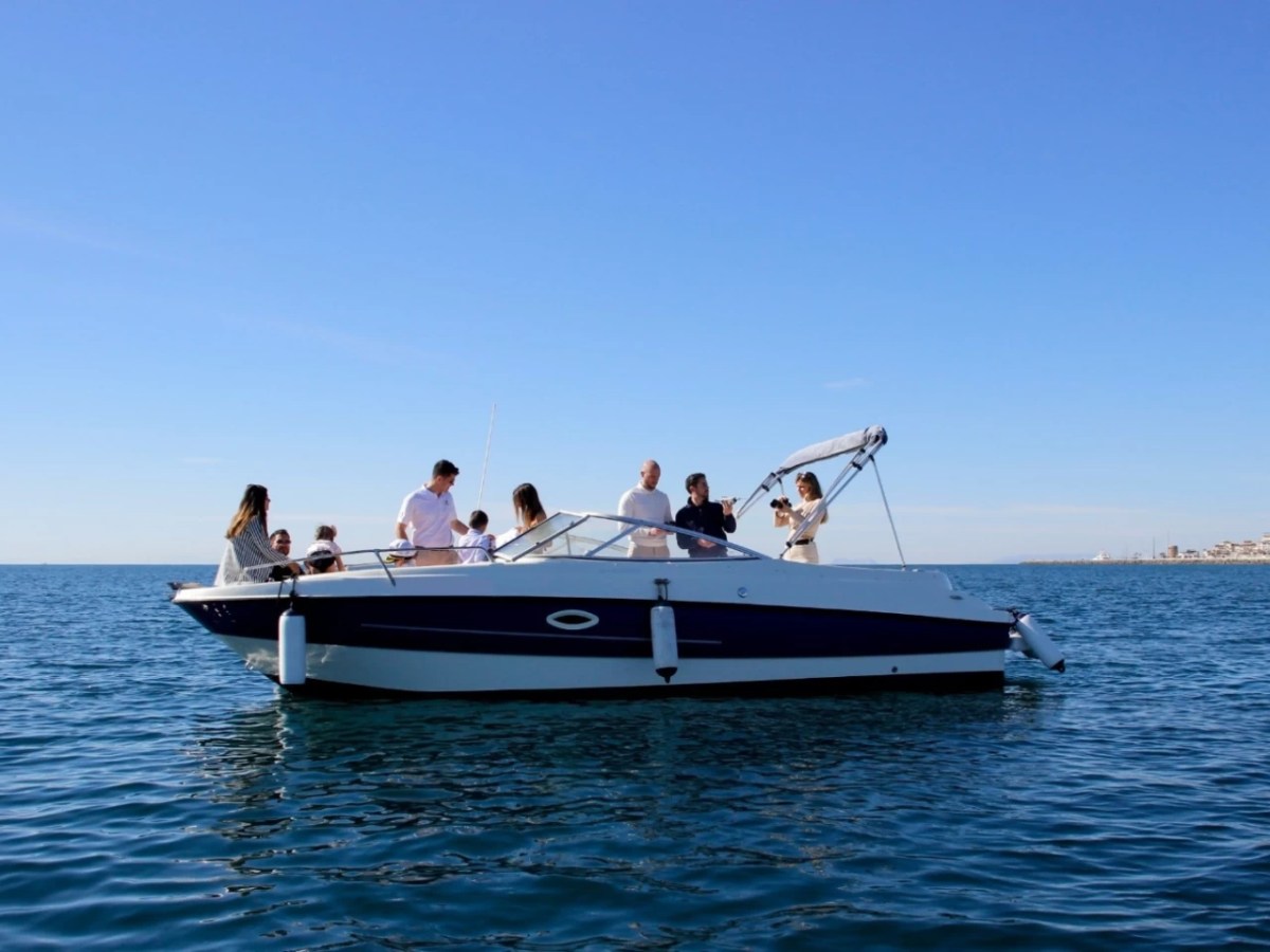 a small boat in a body of water
