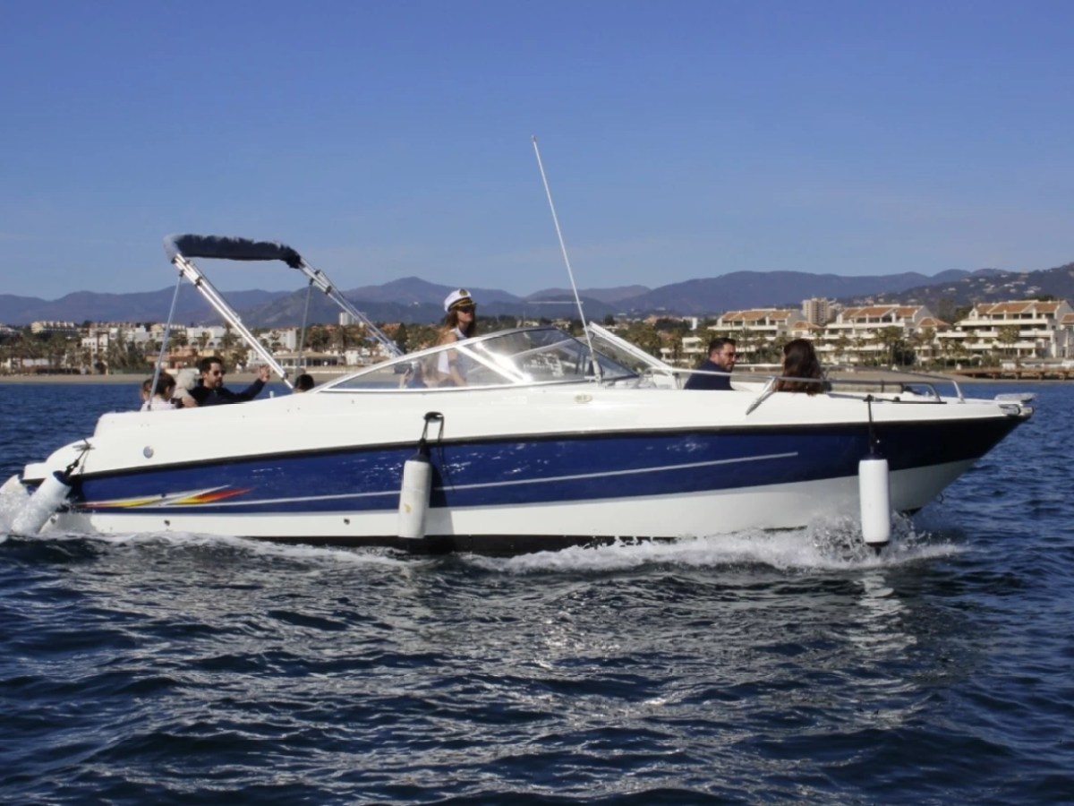 a small boat in a body of water
