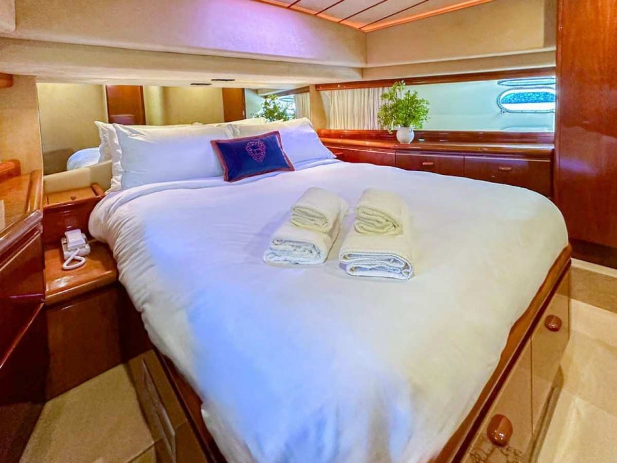 a bedroom with a large bed in a room