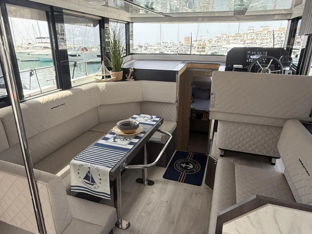 a room filled with furniture and a large window