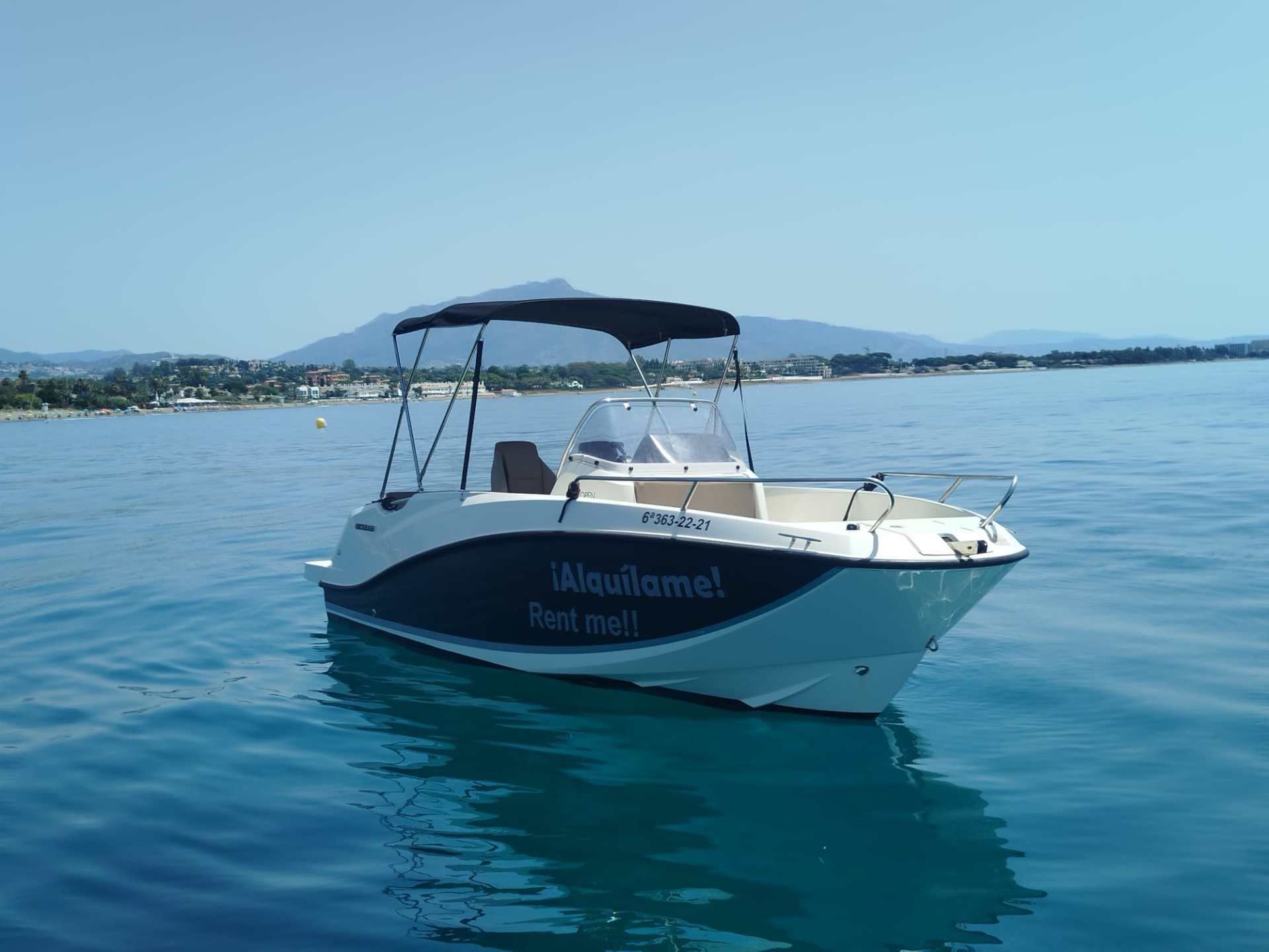 a small boat in a body of water