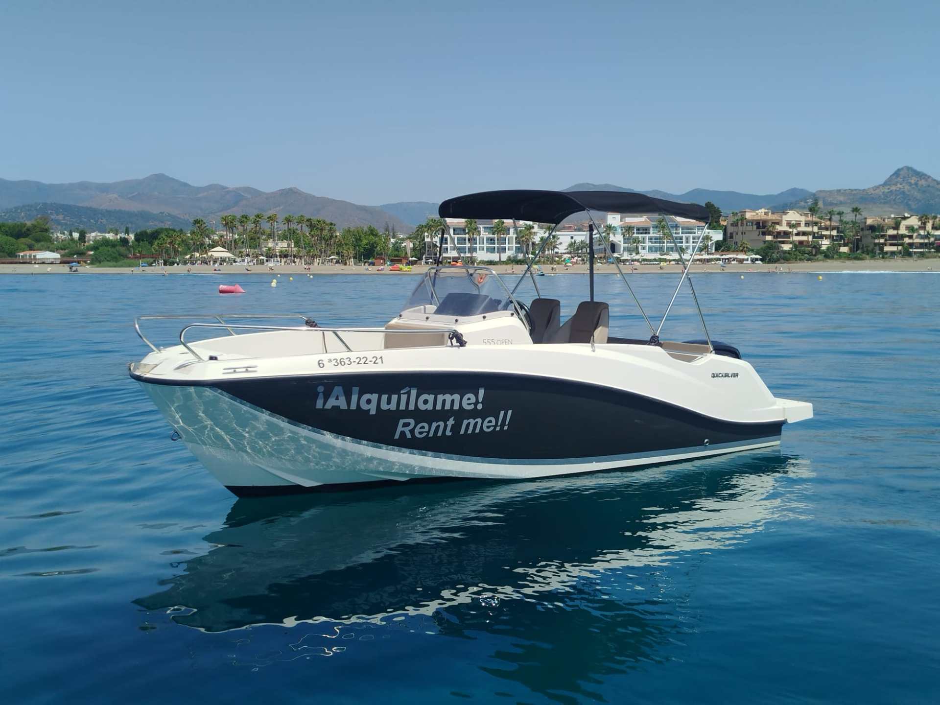 a small boat in a body of water