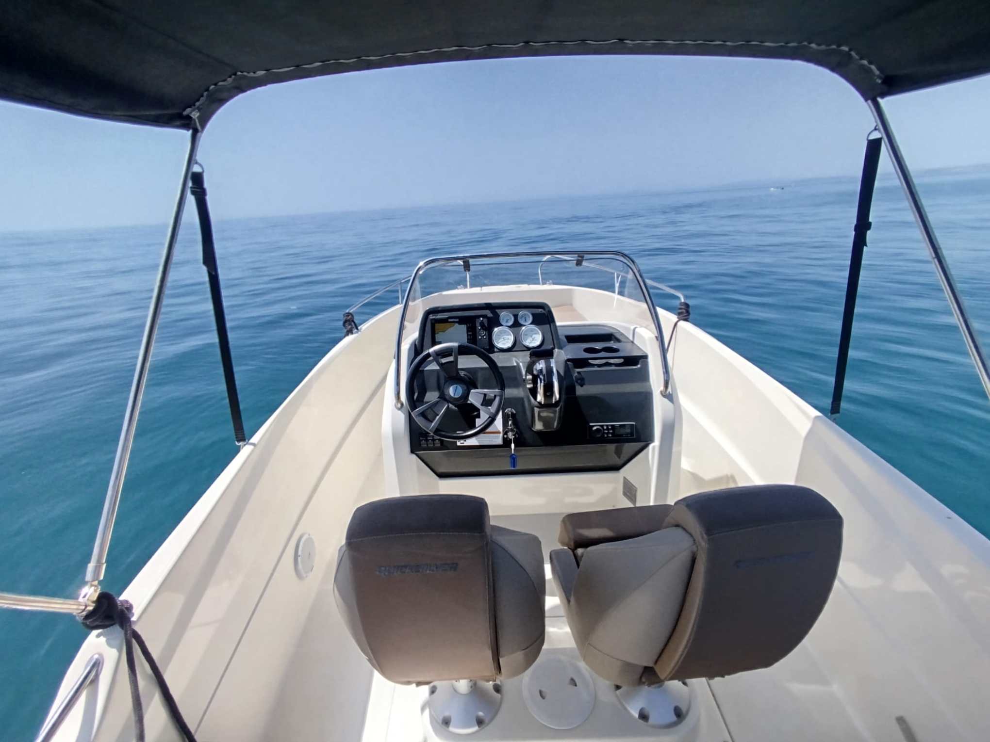 a boat parked next to a body of water