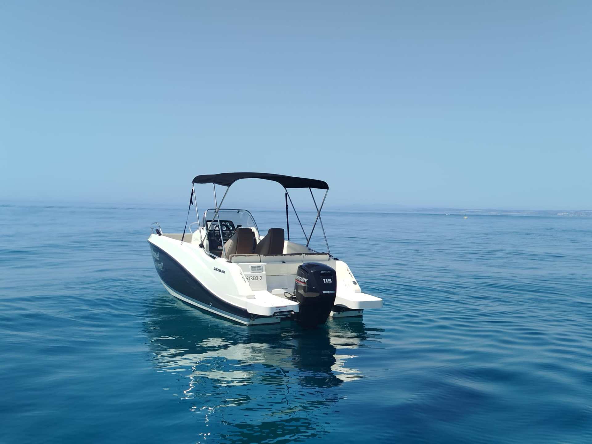 a small boat in a body of water