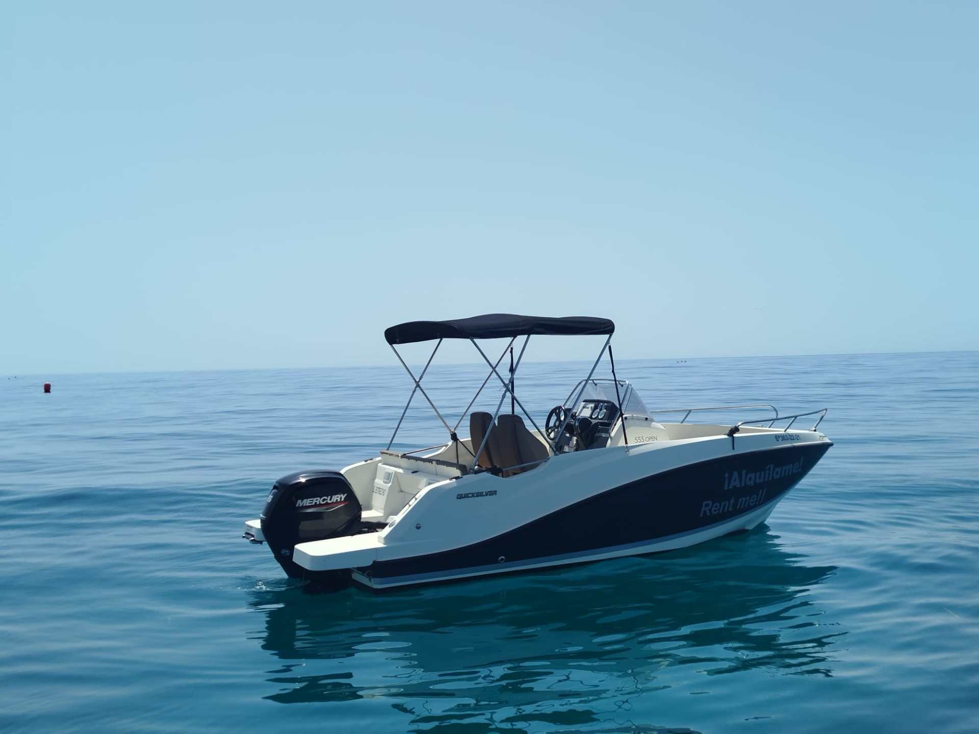 a small boat in a body of water