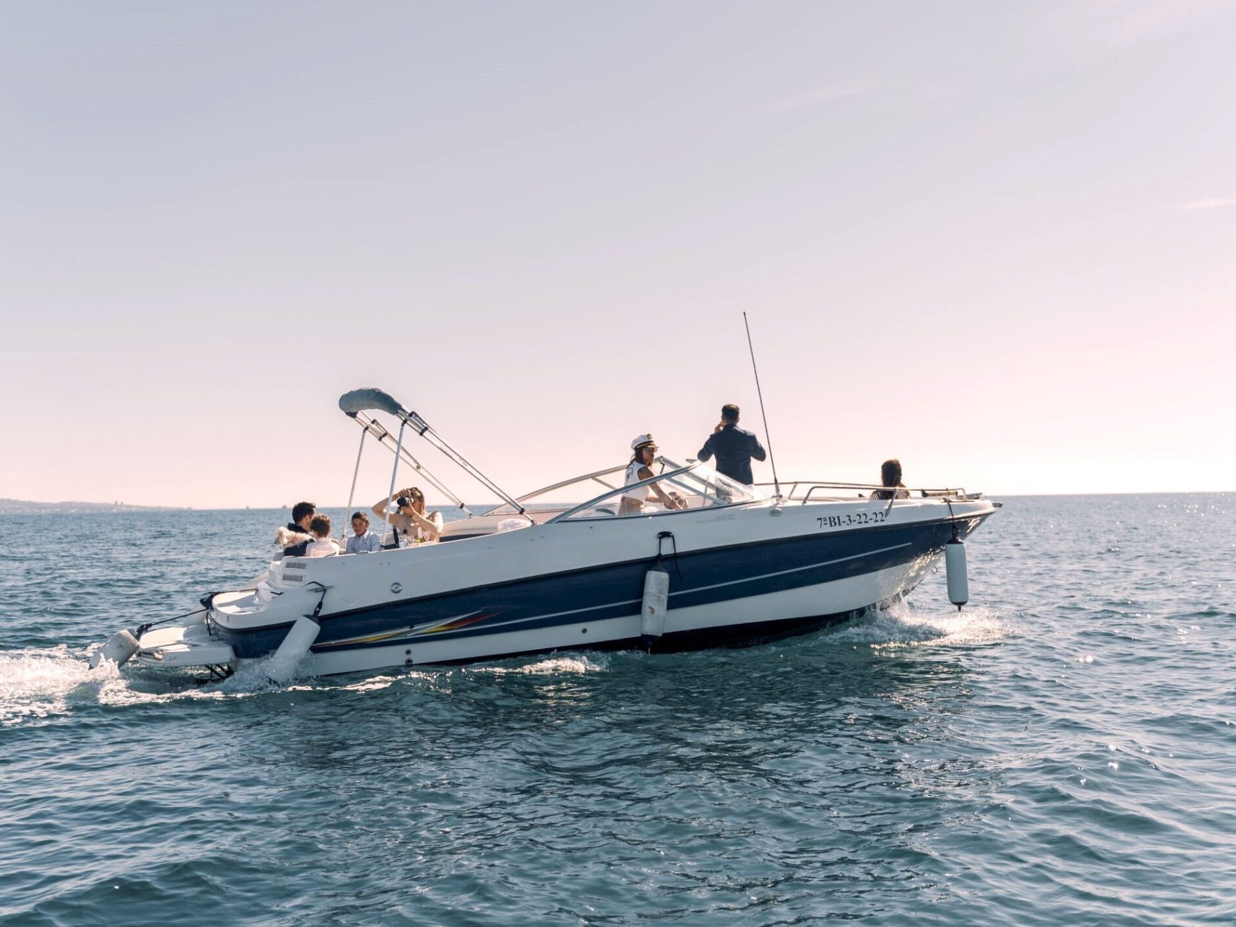 a small boat in a large body of water